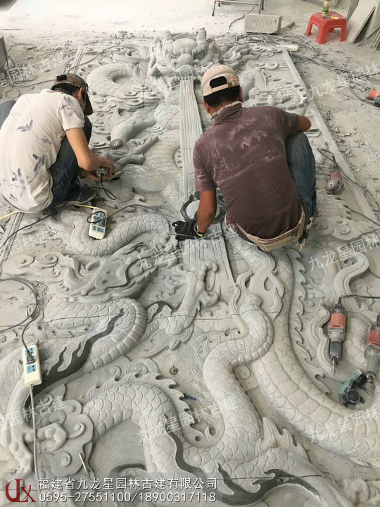石雕浮雕九龙壁图片
