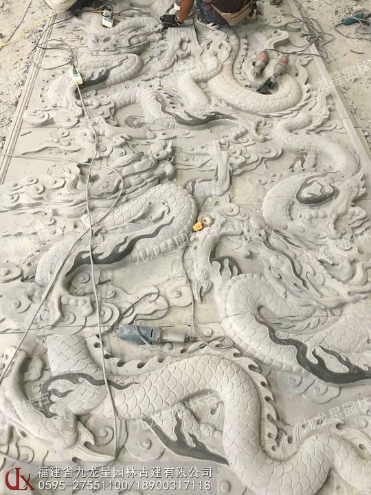 石雕浮雕九龙壁图片